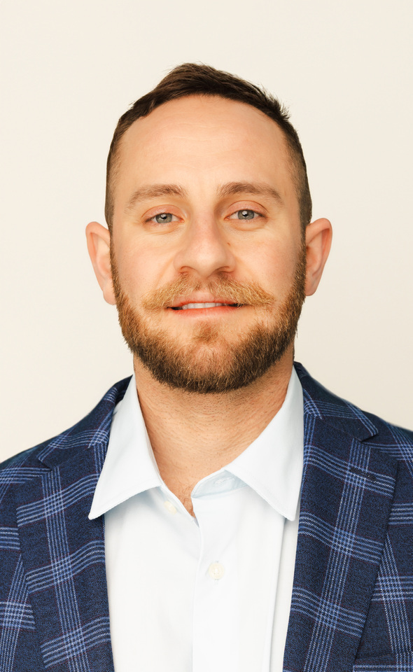Dr. Nikolas Romage